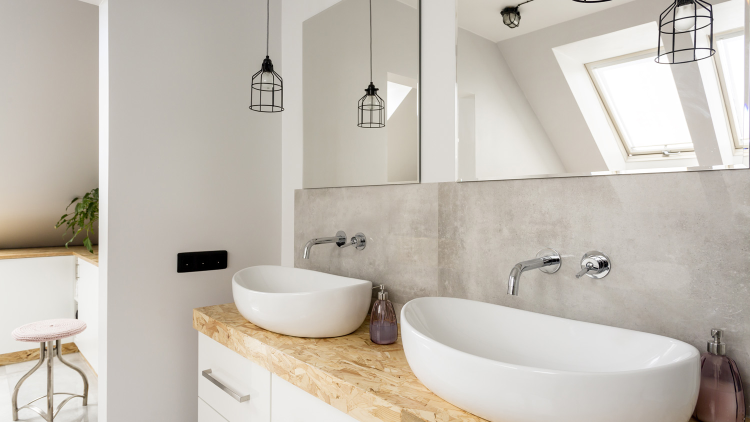 A bathroom vanity with a double sink