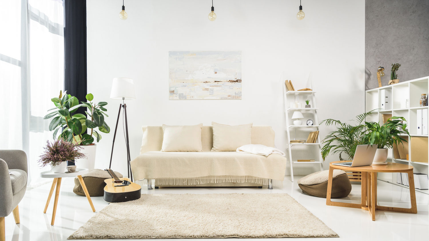 A bright living room with a white wall