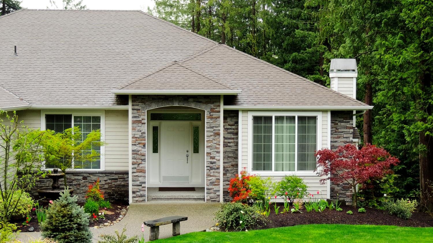The exterior of a house with a beautiful landscaping