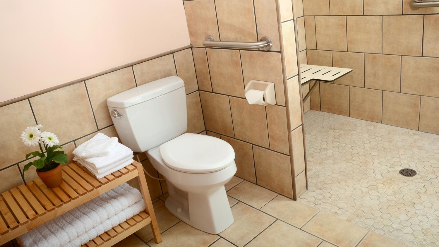 A handicap accessible bathroom with grab bars