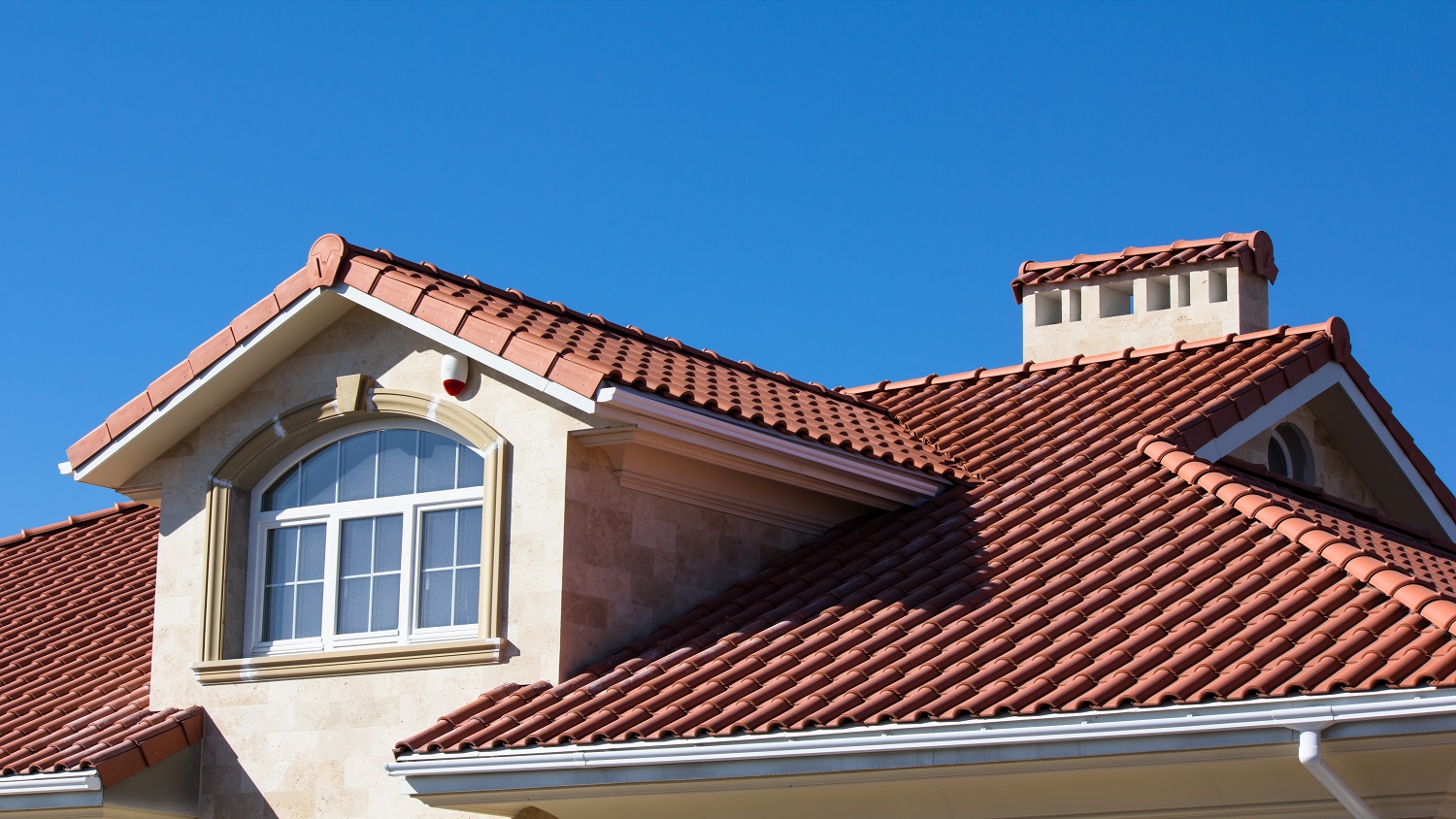 Ceramic tiled roof on house