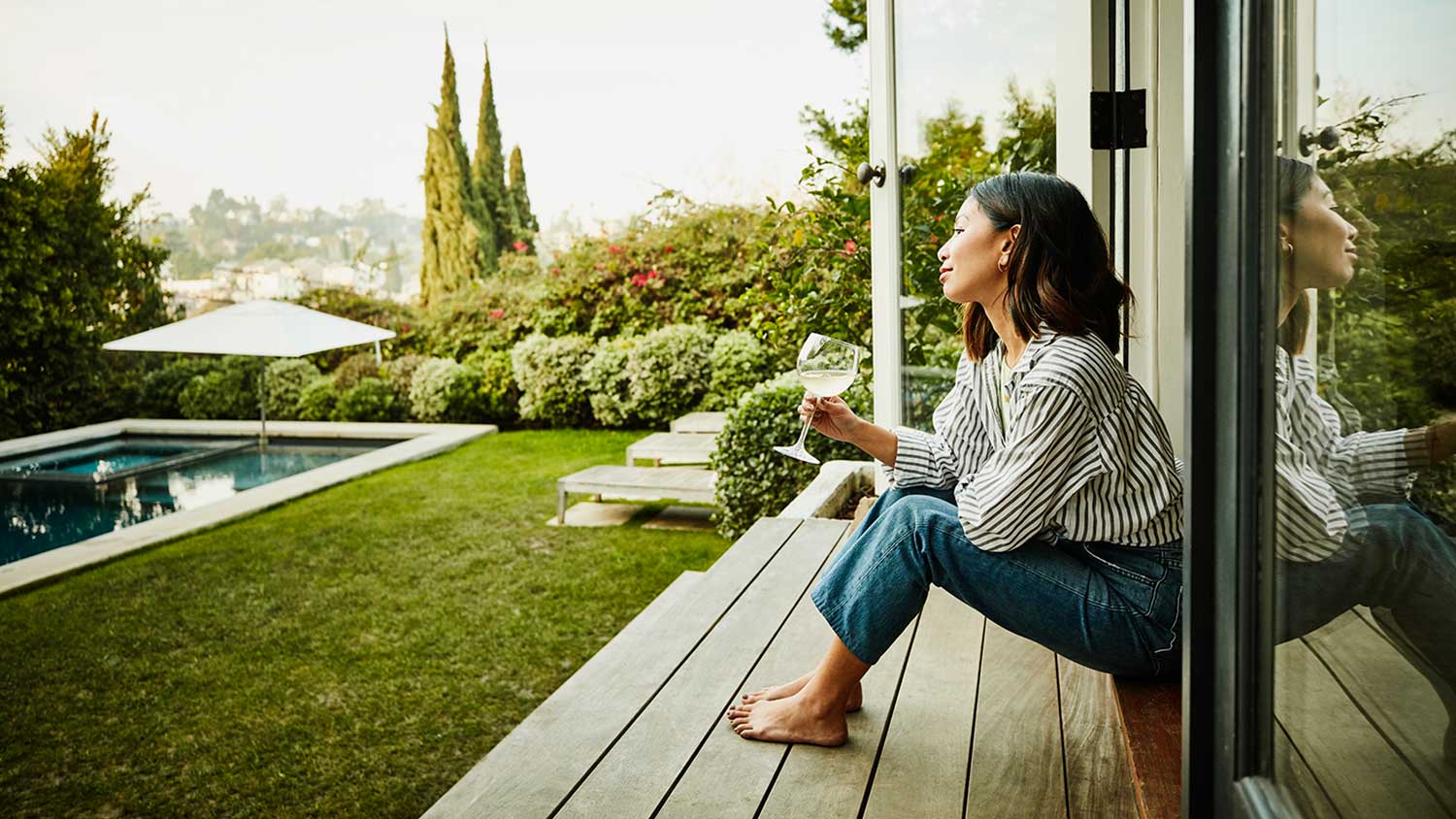 Woman looking at backyard