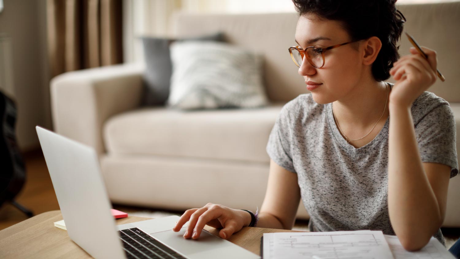 A woman organizing documents